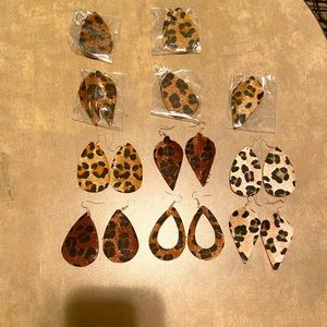 11 pairs of Anlsen Leather Earrings. All cheetah print.